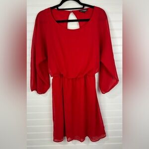 Express women’s red long sleeved mini dress with keyhole back. Size medium